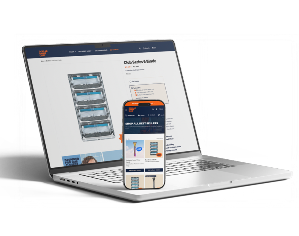 Laptop and smartphone showing Dollar Shave Club product pages with razors for sale.