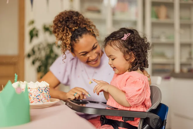 Parent and child with Dorel Juvenile products